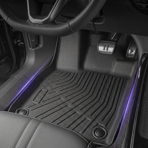 Détail des bords relevés et texture antidérapante des tapis de sol TPE